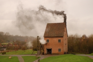 A working replica of the first Newcomen steam engine, 1709, built and operated at the Black Country Living Museum, Dudley. The engine is a similar size, and uses a similar amount of mineral coal, as many of the facilities that produced beer, spirits, glass, and bricks in early modern London